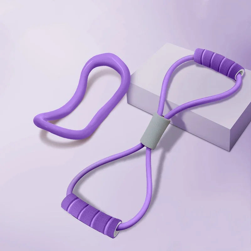 Purple resistance band set for home fitness and strength training on pastel background