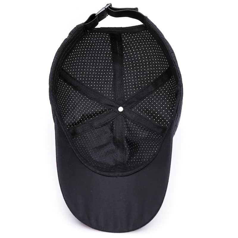 Black mesh fitness cap interior with adjustable strap, breathable design for workouts