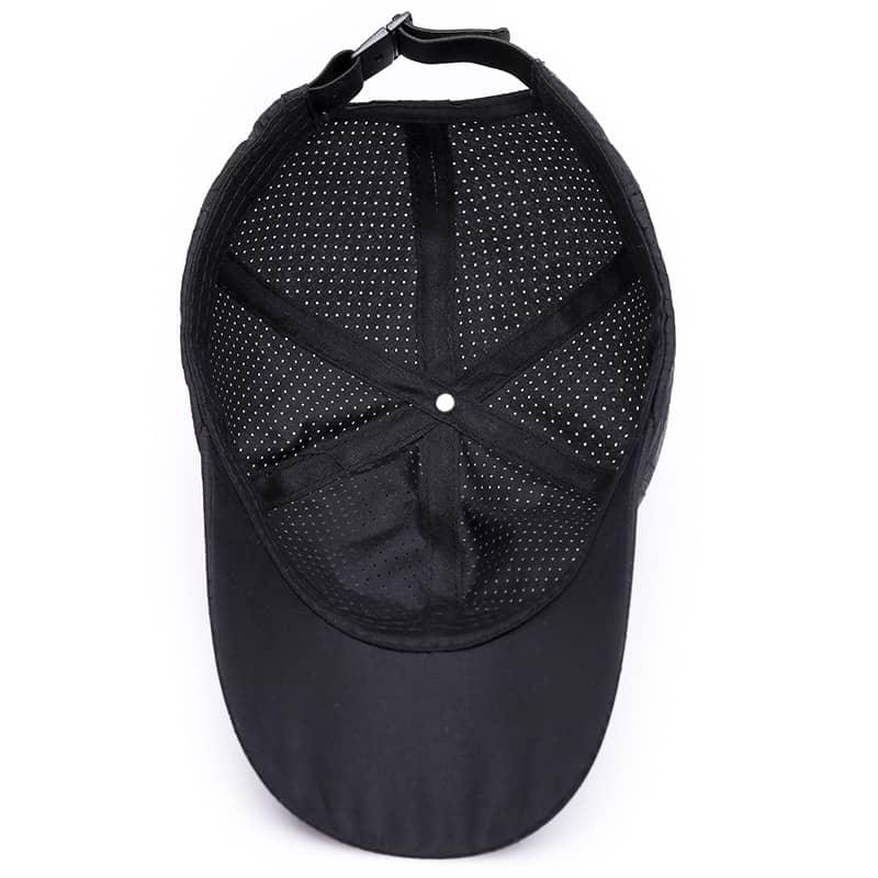 Black mesh fitness cap interior with adjustable strap, breathable design for workouts