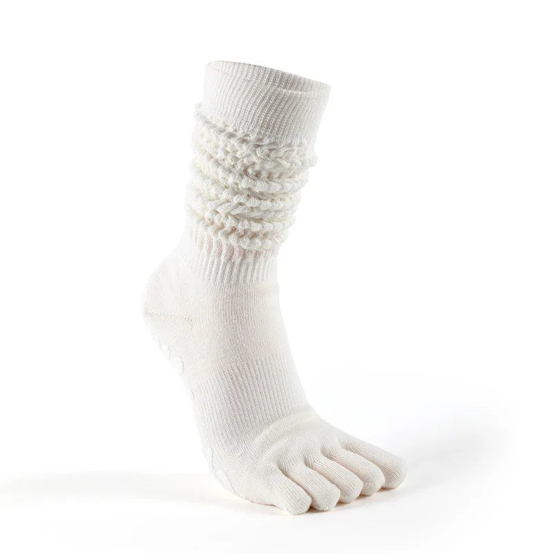 White toe sock with ribbed and textured cuff for fitness and yoga activities.