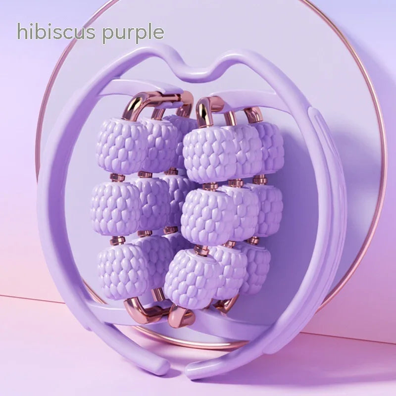 Purple muscle roller massage ring for fitness recovery on pastel background