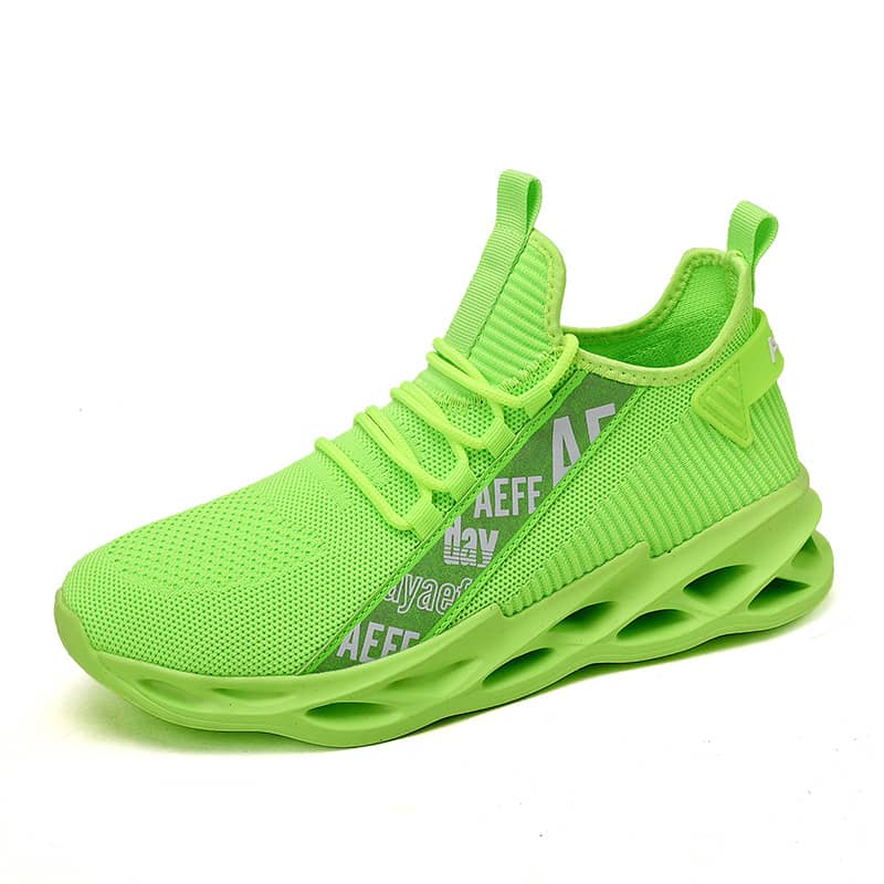Neon green sneaker with unique sole design on a white background