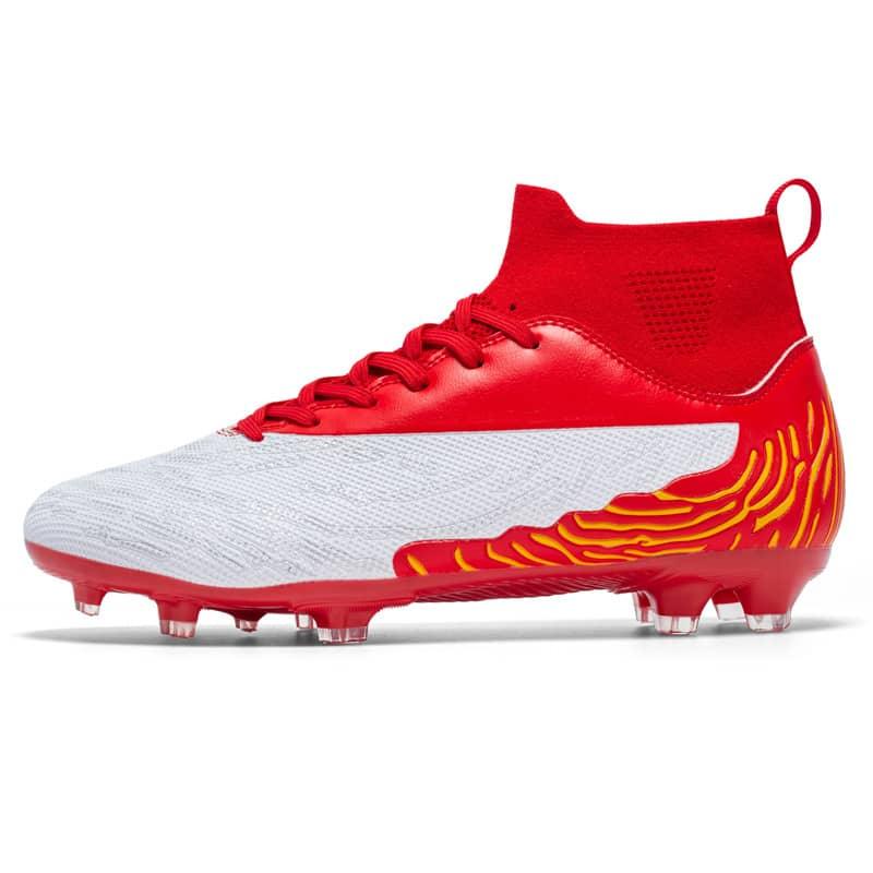 Red and white soccer cleat with yellow accents on a white background