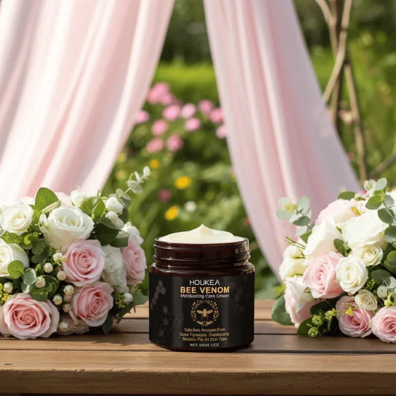 Houkea Bee Venom Moisturizing Care Cream in garden setting with pink roses and floral arrangements