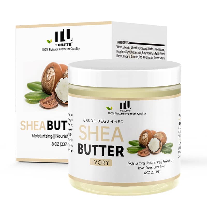 Jar of shea butter with a box on a white background