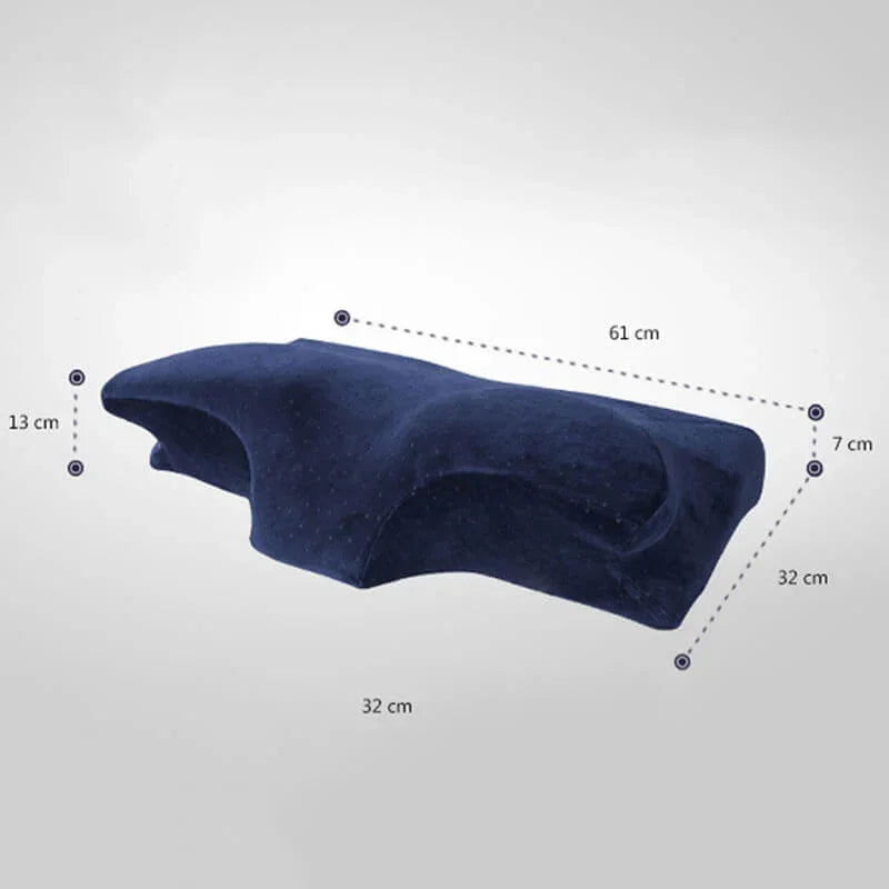 Ergonomic memory foam pillow in navy blue with contour design and dimensions labeled.