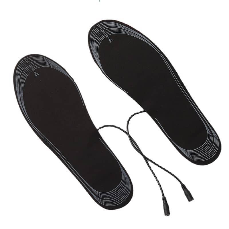 Black electric heated insoles with attached cables for warmth and foot comfort