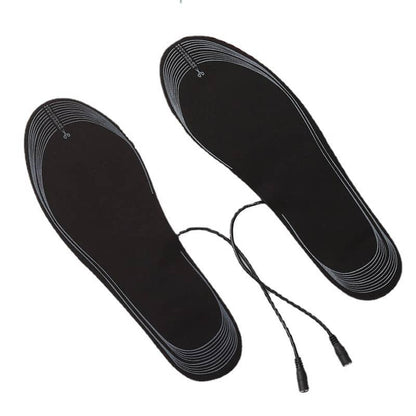 Black electric heated insoles with attached cables for warmth and foot comfort