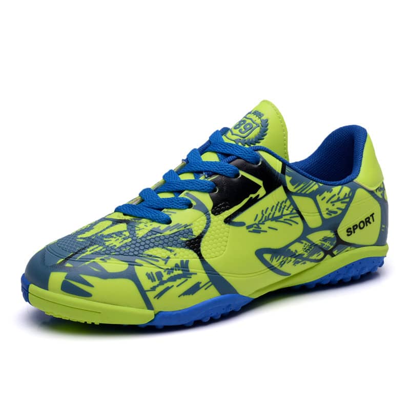 Green and blue sports shoe on a white background