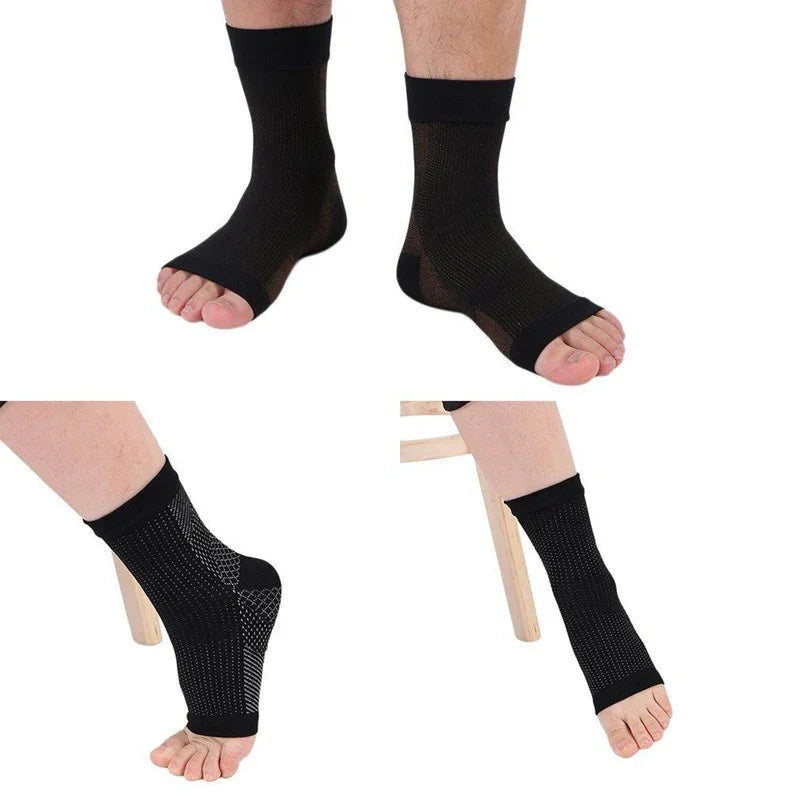Compression ankle support sleeves in black, open-toe foot brace design, shown on feet