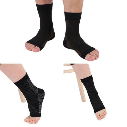 Compression ankle support sleeves in black, open-toe foot brace design, shown on feet