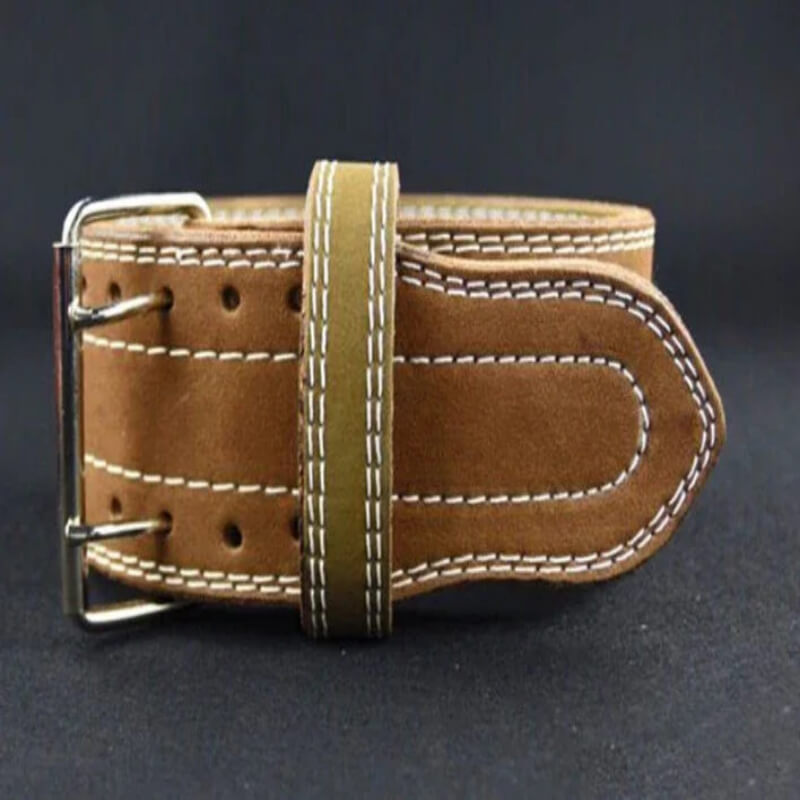 Heavy-duty brown suede leather weightlifting belt with double prong buckle on dark background.