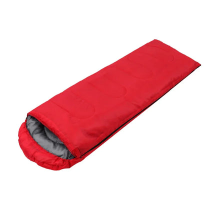 Red rectangular sleeping bag with grey inner lining for camping and outdoor use