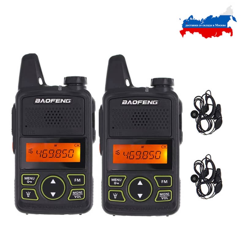 Two black Baofeng walkie-talkies with earbuds on a white background