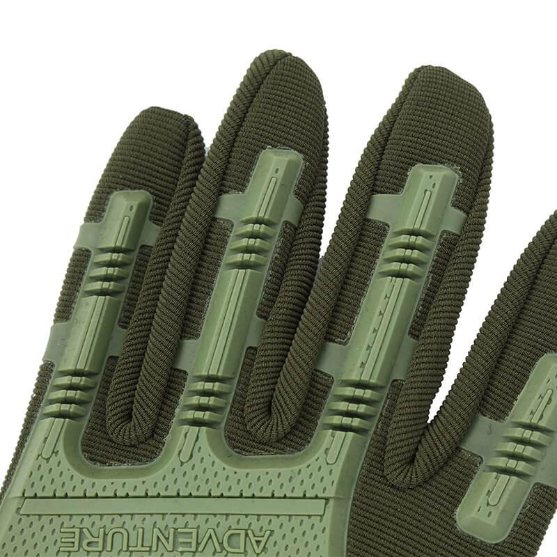 Close-up of green outdoor sports glove with ribbed texture and protective rubber accents