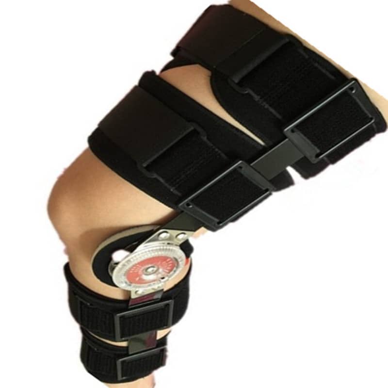Black knee brace with a white background