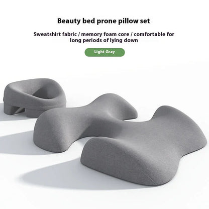 Light gray memory foam beauty bed prone pillow set with ergonomic design on white background