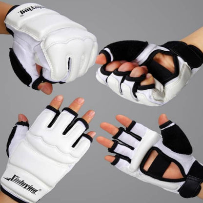 Pair of white and black gloves with cut-out design on a gray background