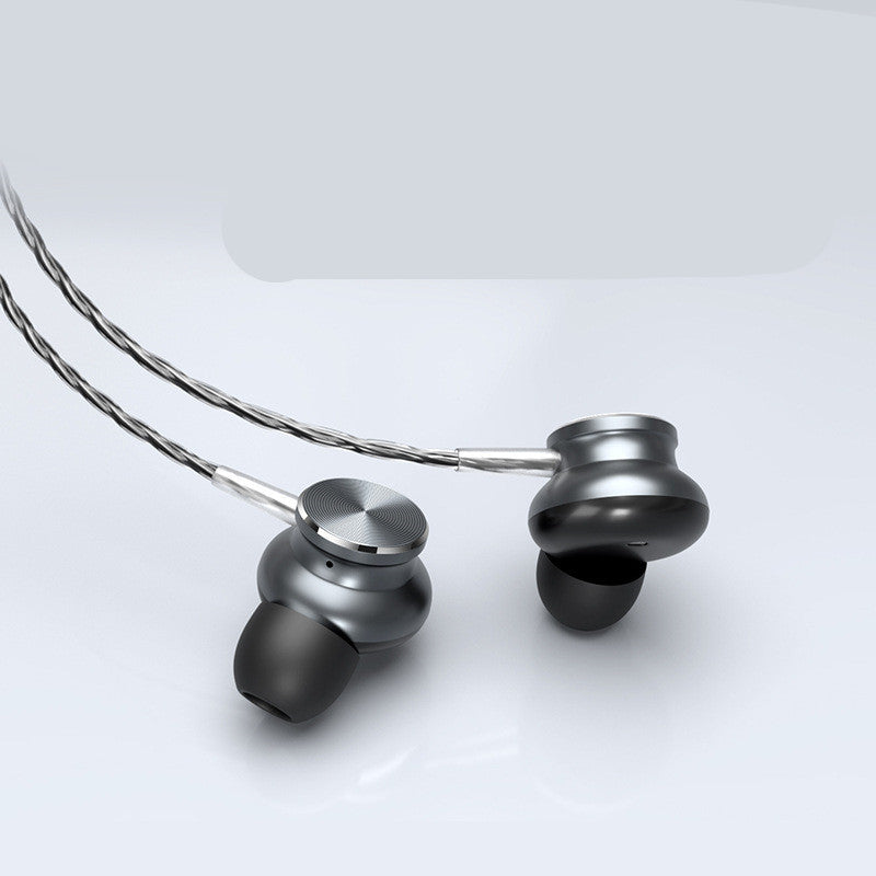 Pair of silver earbuds on a light gray background