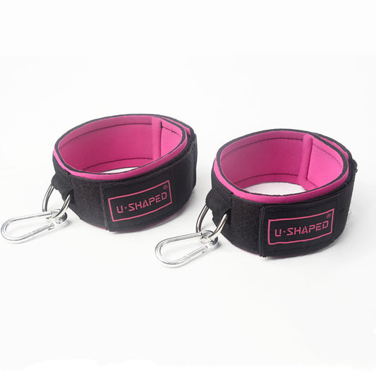 Pair of black and pink U-shaped straps on a white background