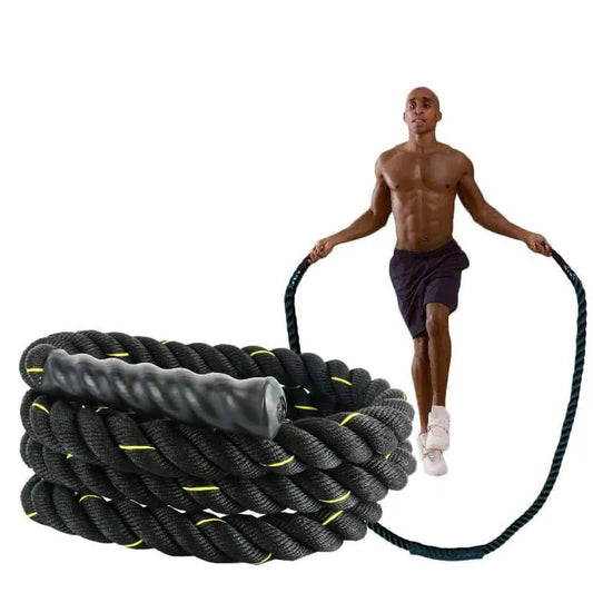 Person holding a large coiled battle rope on a white background