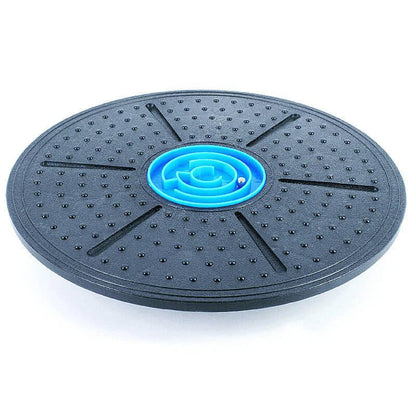 Black exercise balance board with blue center on a white background