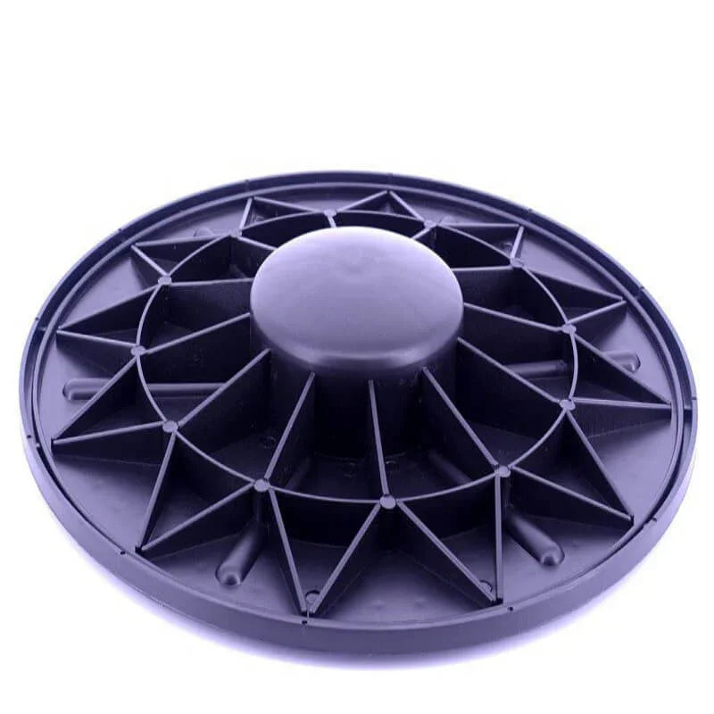 Gray circular object with a central knob on a white background