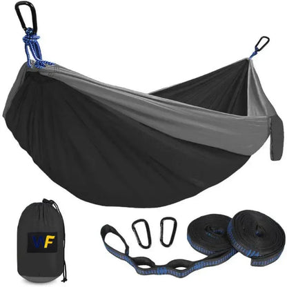 Black and gray hammock with accessories on a white background