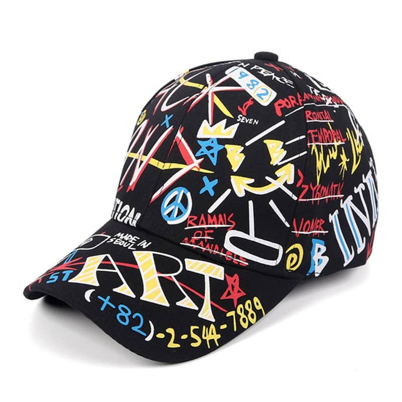 Black baseball cap with colorful graffiti-style art and text, streetwear accessory