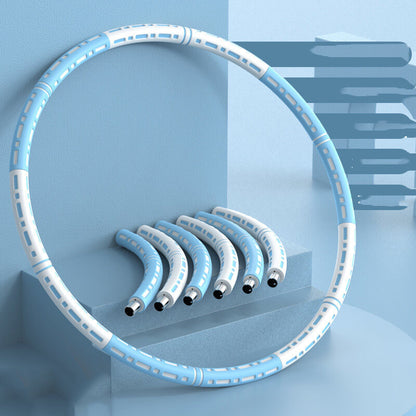 Set of white and blue hula hoops on a light blue background