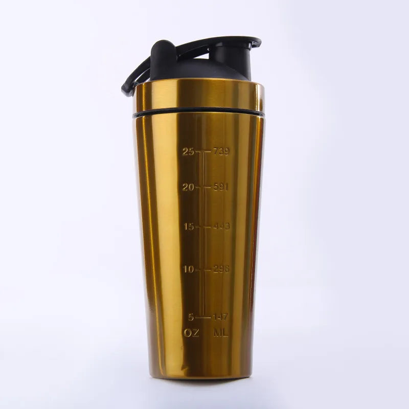 Gold shaker bottle with black lid on a white background