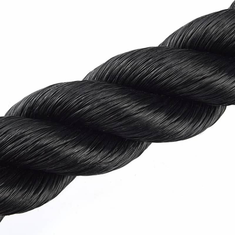 Close-up of a heavy-duty black battle rope for fitness training and strength workouts