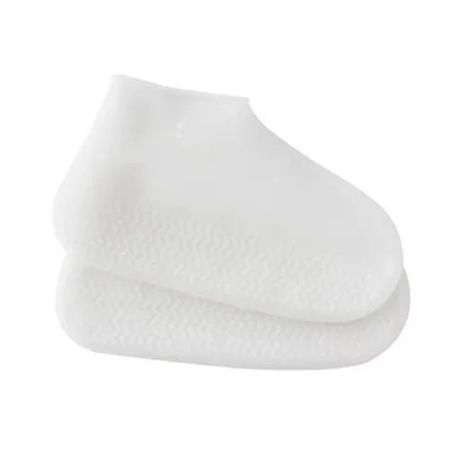 White shoe covers with textured sole on a white background