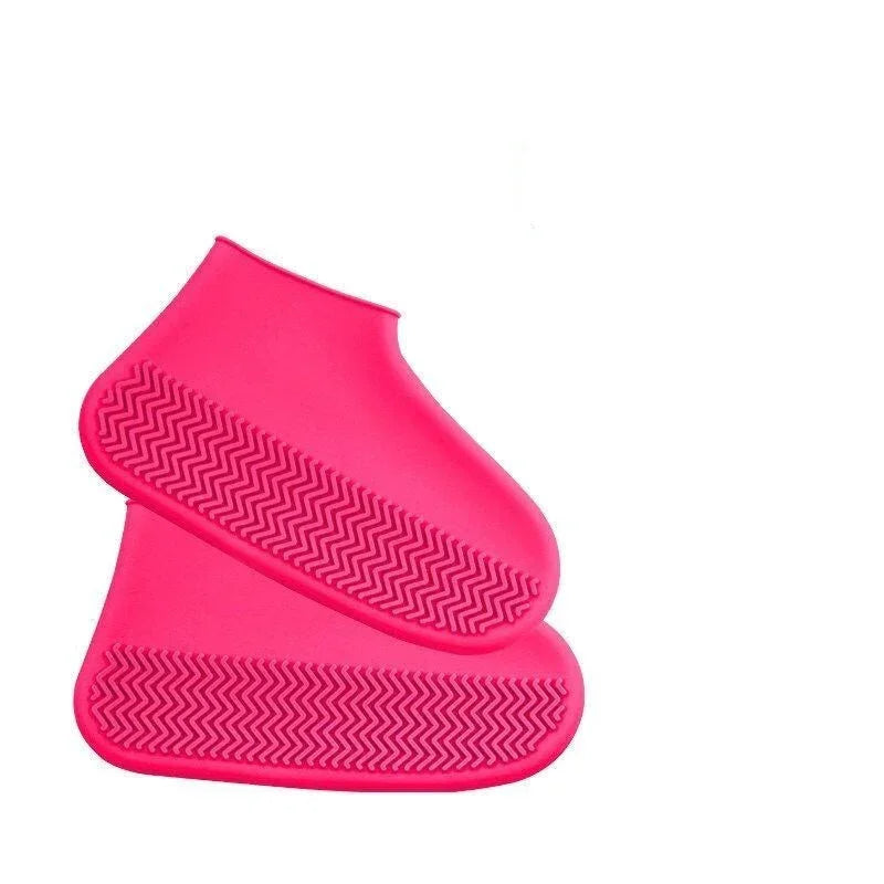 Bright pink silicone shoe covers with non-slip tread for outdoor fitness protection