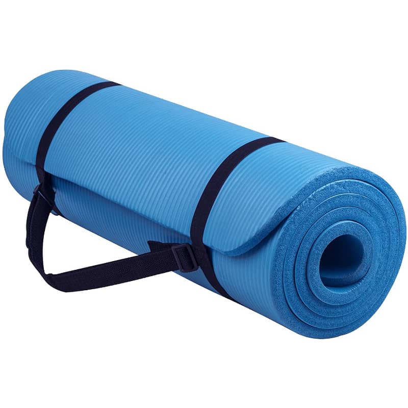 Blue yoga mat with black straps on a white background