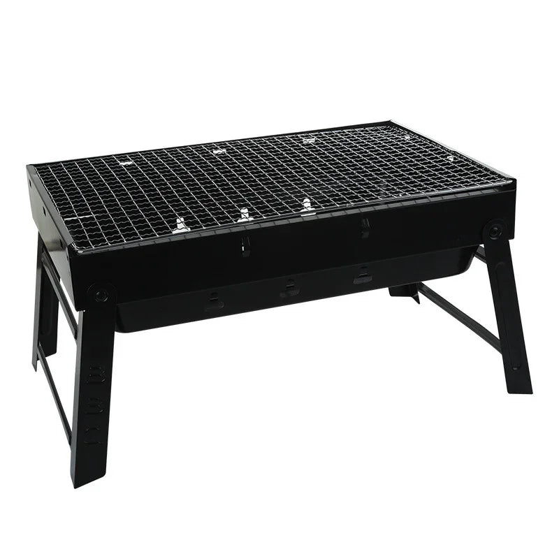 Portable black outdoor charcoal grill with foldable legs and metal grate