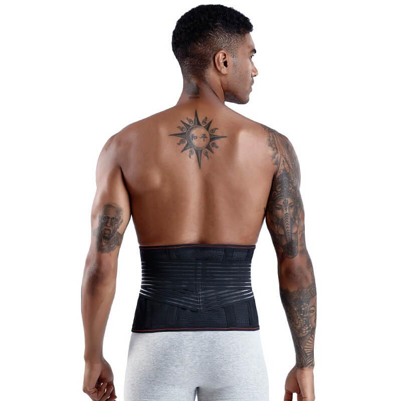 Man wearing a black waist support belt on a white background
