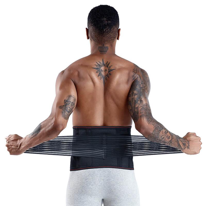 Man wearing a black waist support belt with tattoos on his arms and back.