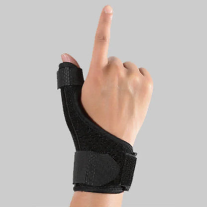 Hand with black wrist support brace on a gray background