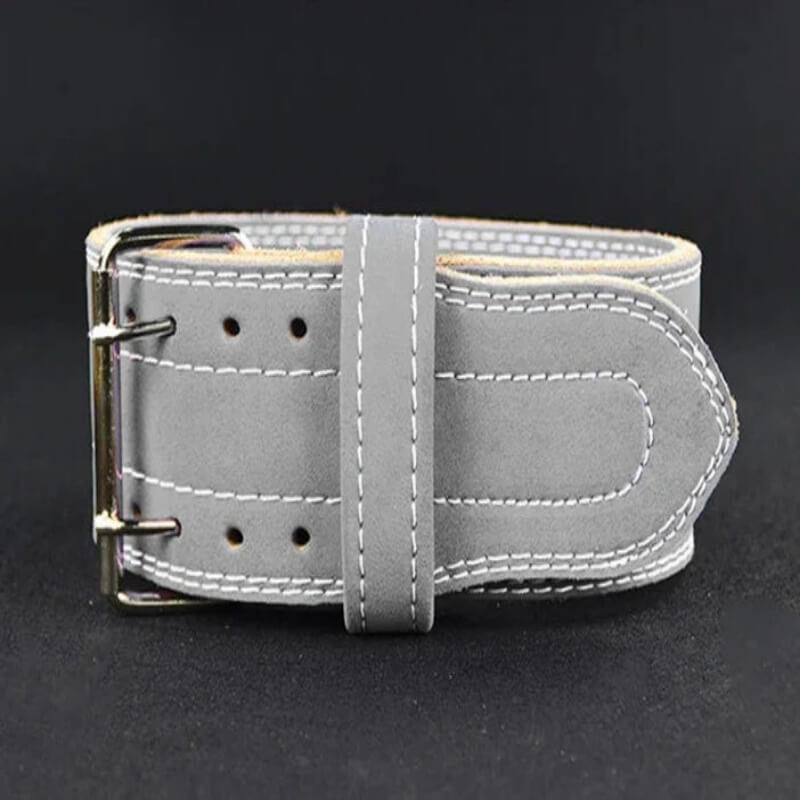 Gray suede weightlifting belt with white stitching and double prong buckle on black background