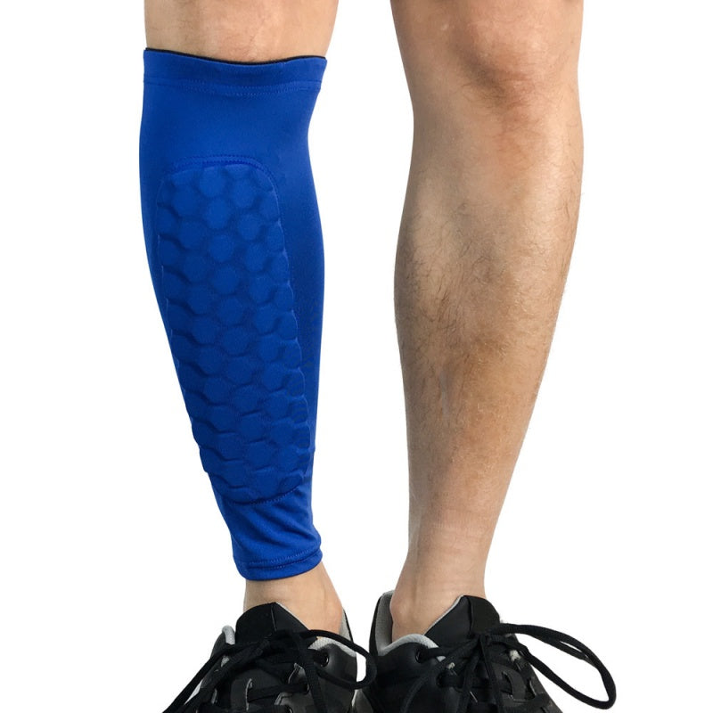 Blue leg sleeve on a person's leg with a white background