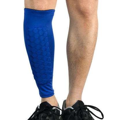 Blue leg sleeve on a person's leg with a white background