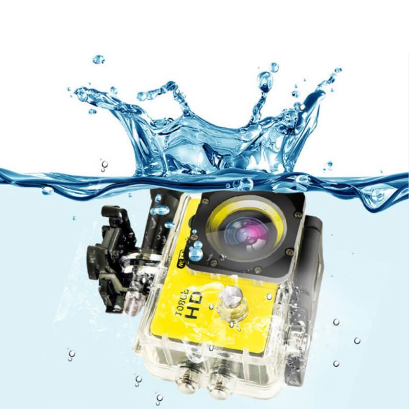 Yellow waterproof action camera submerged in water with splash, outdoor sports gear