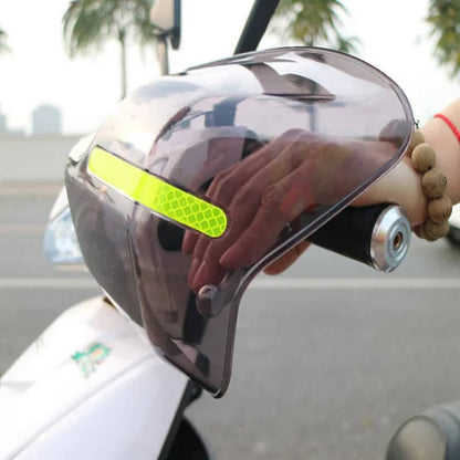 Scooter handlebar shield with reflective strip for wind protection outdoors