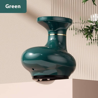 Green vase with gold accent on a neutral background