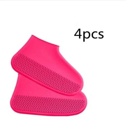 Two pink shoe covers with a textured sole on a white background, labeled '4pcs'.