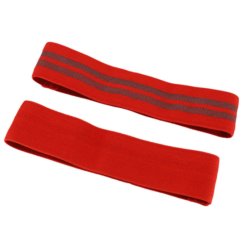 Two red arm sleeves with reflective stripes on a white background