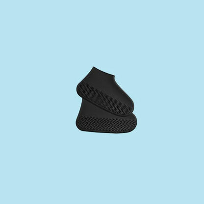 Black shoe sole on a light blue background