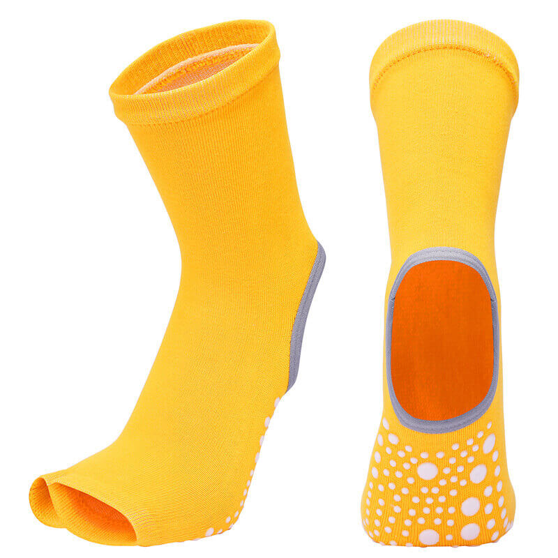 Yellow socks with a sole design on a white background