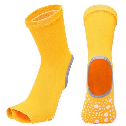 Yellow socks with a sole design on a white background